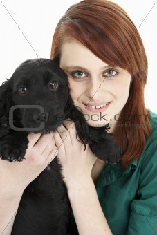 Girl With Black Spaniel Puppy
