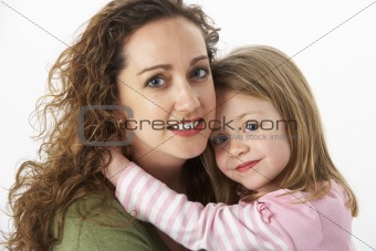 Portrait Of Cuddling Mother And Child