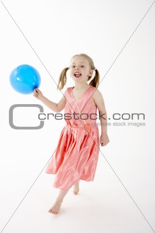 Young Girl Holding Party Balloon