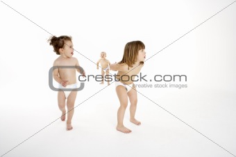Three Young Children Playing In Studio