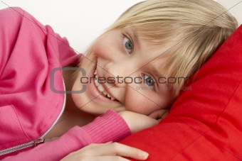 Young Girl Relaxing On Sofa