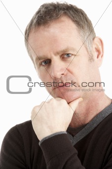 Portrait Of Thoughtful Middle Aged Man