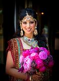 Smiling Indian Bride with Bouquet