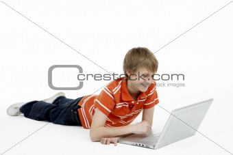 Young Boy Using Laptop Computer