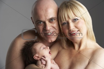 Parents Holding Newborn Baby