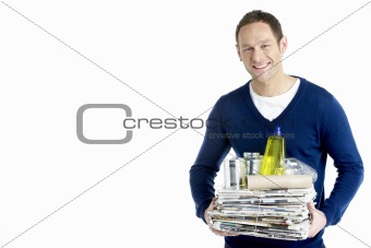Man Carrying Stack Of Recycling 