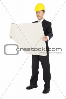 young architects holding a set of building plans isolated on a white background