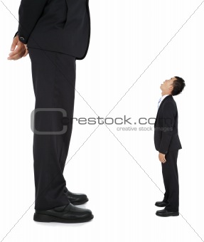 Little businessman looked at a giant businessman