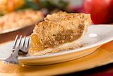 Apple Pie Slice with Crumb Topping and Fork.