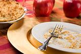 Apple Pie, Empty Plate with Remaining Crumbs and Fork.