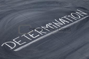 determination word on blackboard