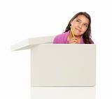 Attractive Young Ethnic Female with Pencil Popping Out and Thinking Outside The Box Isolated on a White Background.