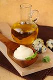 Mayonnaise with ingredients, quail eggs and olive oil