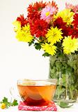 Still life with flowers and tea