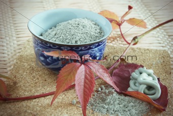 Porcelain drinking bowl with powder of clay and prepared mixture