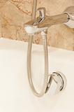 Faucet with handles and white bath