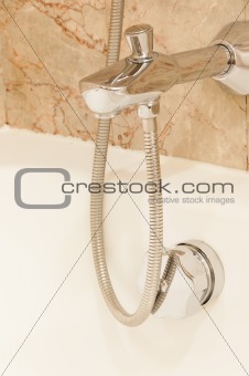 Faucet with handles and white bath