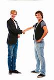 Two modern teenage boys shaking hands. Isolated on white