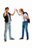 Young man with mobile showing wait gesture his indignant friend