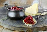 french cuisine - onion confiture on wooden table