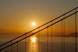Sunrise over Golden Gate and Oakland Bay Bridge