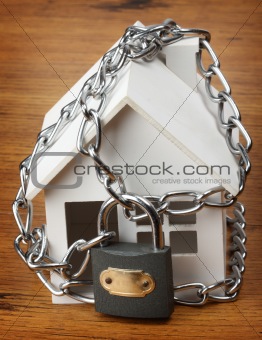 house with chain and padlock,