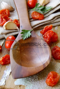 Old wooden spoon  on kitchen table