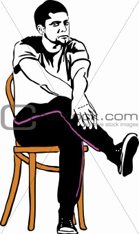  guy in sneakers sitting on a wooden chair