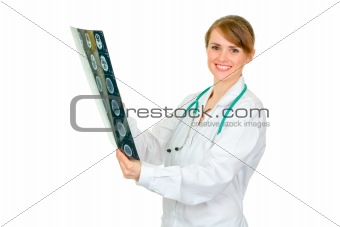 Smiling medical female doctor holding patients roentgen
