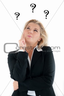 beautiful business woman in a suit having trouble and questions.