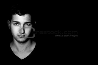 young man low key, black and white