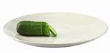 fresh green cucumber chopped on white plate