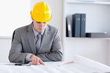 Architect working on building plan