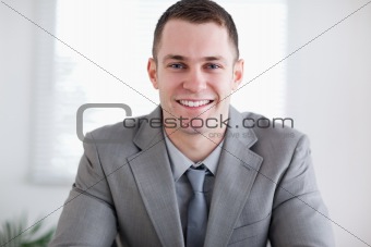 Close up of smiling businessman