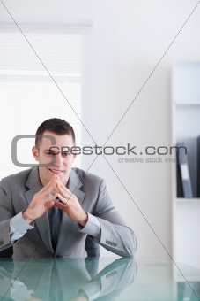 Close up of young businessman in a successful negotiation