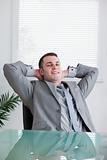 Close up of young businessman relaxing
