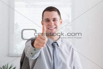 Happy businessman giving his approval