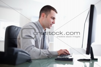 Businessman working concentrated on his computer