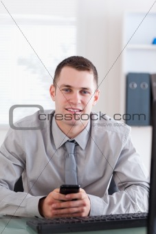 Close up of businessman with cellphone