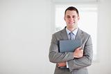 Businessman with folder in his arms