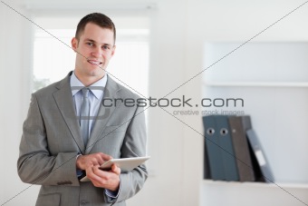 Smiling businessman with his notes