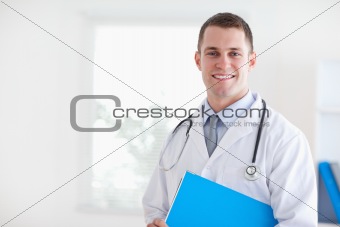 Close up of doctor with folder