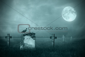Gravestones in moonlight