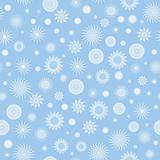 White snowflakes on a blue background.