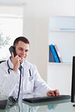 Doctor talking with patient on the telephone