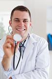 Smiling doctor with his stethoscope
