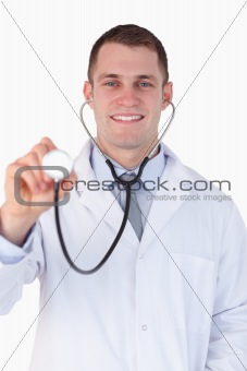 Close up of doctor using stetshoscope