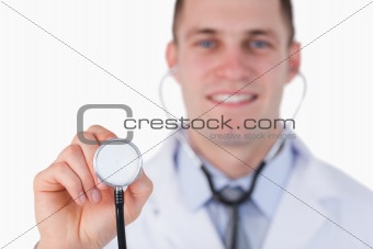 Close up of smiling doctor with stethoscope