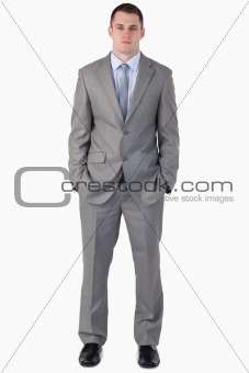 Young businessman with hands in his pocket