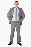 Businessman with arms akimbo